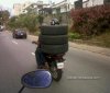 La-Mejor-Manera-De-Llevar-Tres-Cauchos-Y-Un-Pana-En-Una-Moto-soloenvenezuela.jpg